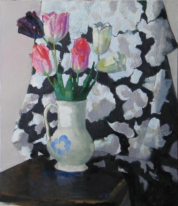 Tulips in the wite jug.